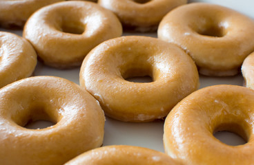Many donuts in a row.