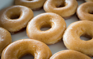 Many donuts in a row.