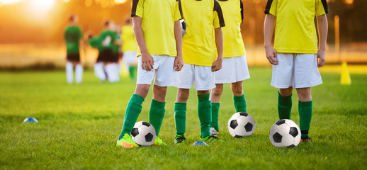 Boys Training Soccer. Children Playing Football in a Stadium. Soccer Players Team. Football Training for Kids