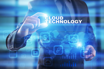Businessman selecting cloud technology on virtual screen.