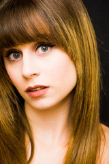 Naklejka premium Beauty Woman Portrait over Black Background
