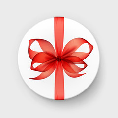 White Round Gift Box with Transparent Red Scarlet Bow and Ribbon Top View Close up Isolated on Background