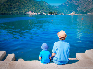 father and son looking at scenic view in Montenegro
