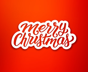 Merry Christmas calligraphic text on white paper label over red background. Sticker or greeting card vector design template for Xmas celebration