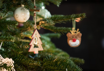 wooden toy on a christmas tree