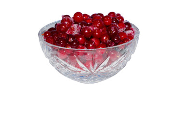 Frozen berries cranberries in a crystal vase