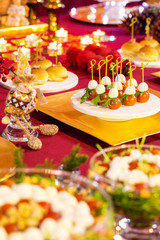 Cherry Tomatoes and Appetizers at the Christmas Table