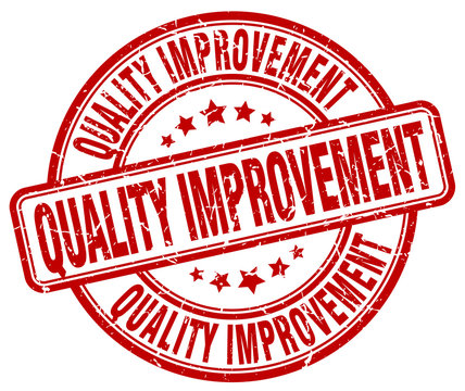 Quality Improvement Red Grunge Stamp