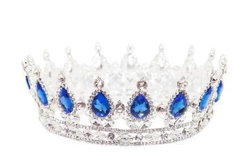 Crown with sapphire isolated on white background