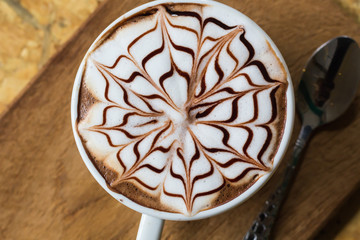 latte on wooden table brown color