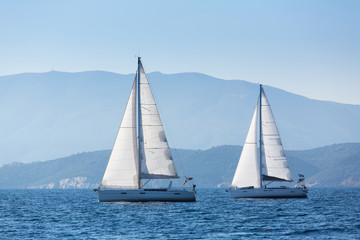 Fototapeta na wymiar Sailing regatta. Luxury yachts at Aegean Sea. Cruise yachting.