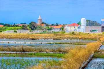 Nin town scenery Croatia. / View at scenic in old croatian place with salty fields in foreground, european travel destination