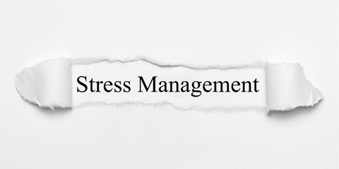 Stress Management on white torn paper