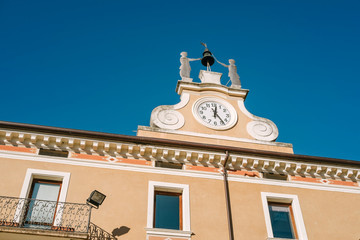 Fototapeta na wymiar Building with clock, Bardolino - Garda lake Italy