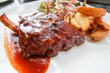 Closeup grilled pork baby ribs with barbecue sauce