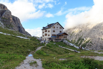 Fototapeta na wymiar Alpine Hut Zsigmondyhütte in Sexten Dolomites, South Tyrol, Italy