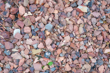 Abstract various pebble rock stones texture background with round pebble