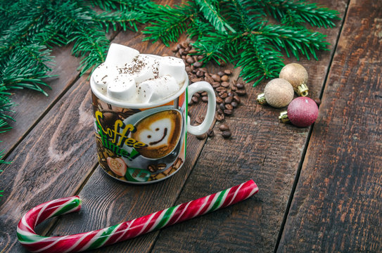 Coffee with marshmallow on christmas background