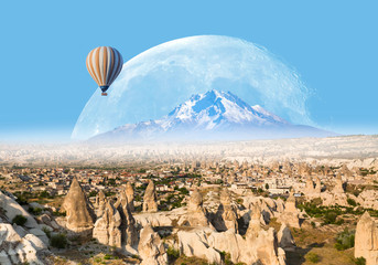Full moon rising above , Cappadocia "Elements of this image furnished by NASA"