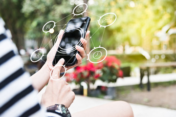 people hand pressing screen of smart phone in social media conce