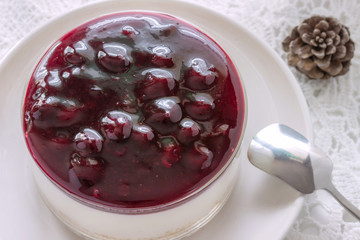 Blueberry cheesecakes served in glass ramekins