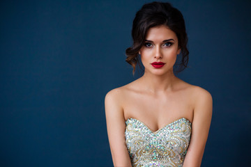 Fashion photo of beautiful lady in elegant evening dress