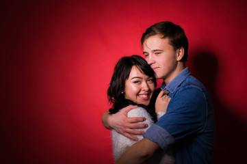 Cute sexy funny young couple in the studio	