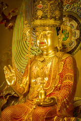 Buddha statue inside the Buddha Tooth Relic Temple and Museum