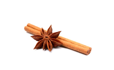 Aromatic star anise and cinnamon isolated on white background