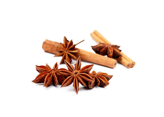 Aromatic star anise and cinnamon isolated on white background
