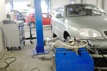 Fototapeta premium Car in a car repair station