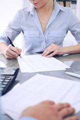 Bookkeepers or financial inspector making report, calculating or checking balance. Audit concept.