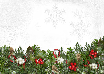 Christmas border with branches, mistletoe and holly on white