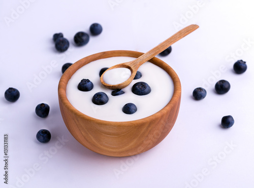 Blueberries Wooden Bowl On White Background Stock Photo