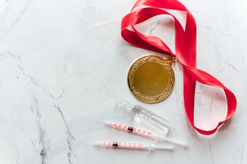 Concept of doping in sport - deprivation medals top view