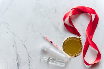 Concept of doping in sport - deprivation medals top view