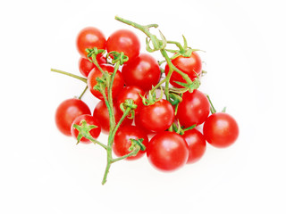 heap of red tomatoes isolated on the white