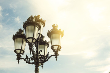 Detail of street lamp in Barcelona city on a sunny day
