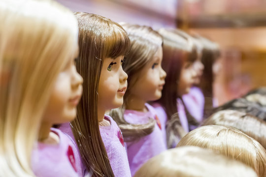 Many dolls,  selective focus with shallow depth of field.