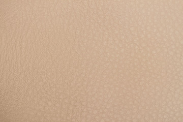 Texture of genuine leather close-up, cowhide, background. Hazelnut