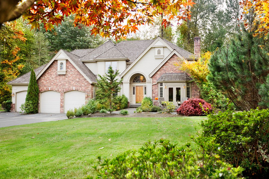 Suburban home from the front garden in early Autumn as the leaves begin to turn