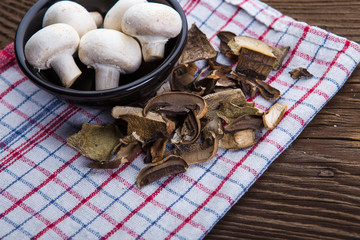 Mushrooms on wooden background