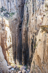 Hiker woman walking along the Caminito del Rey, Spain