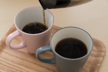 pair of mug and coffee pot