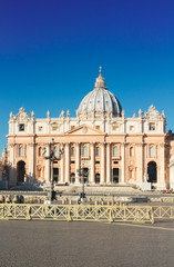 Fototapeta premium St. Peter's cathedral in Rome at sunny summer day with blue sky, Italy