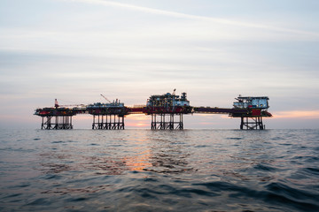 Silhouette of an offshore oil installation 