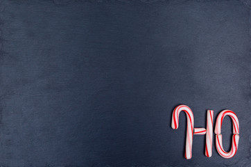 Holiday candy cane text HO