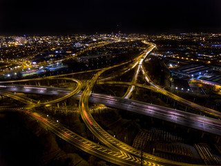 Aerial view of Spaghetti Junction and Birmingham city centre at night.