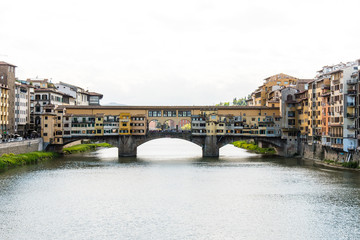 Obraz premium Ponte Vecchio in Florence Italy, Bridge with Shops, Arno