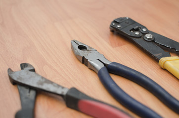 Closeup of hand tools on floor